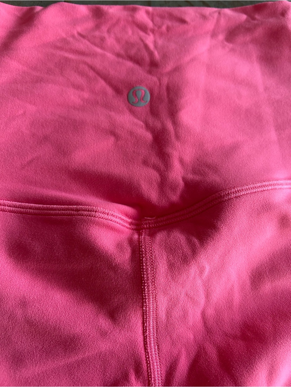 lululemon athletica women’s  Hot Pink Leggings with Reflective Logo. Like new